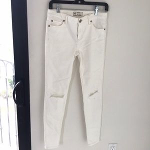 White ripped knee free people skinny jeans